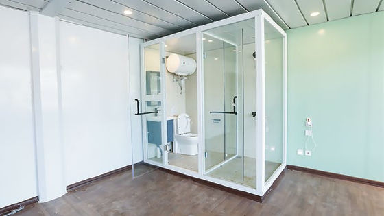 Ασφαλές και ανθεκτικό flat pack container house με ηλεκτρικό ρεύμα και γρήγορο χρόνο εγκατάστασης