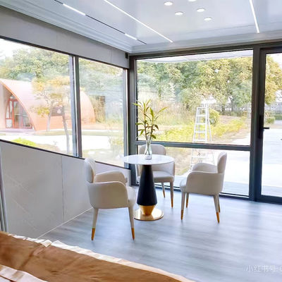 Apple Cabin House Δυνατό γαλβανισμένο ατσάλινο πλαίσιο και μεταλλικό σκαλισμένο πάνελ για τα πρότυπα και τις απαιτήσεις σας